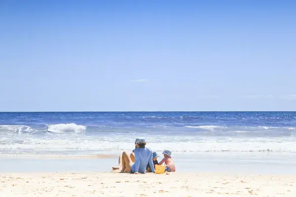 Family on the beach Gold coast Queensland Unsplash