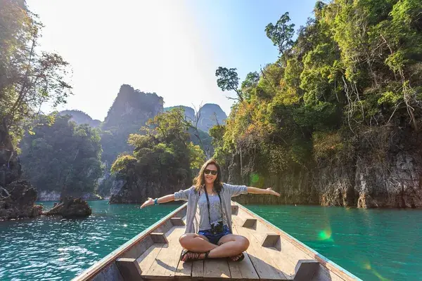 Karsts in thailand woman on a boat