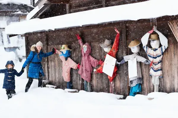 Mum and daughter family snowing Japan tourists Hokkaido